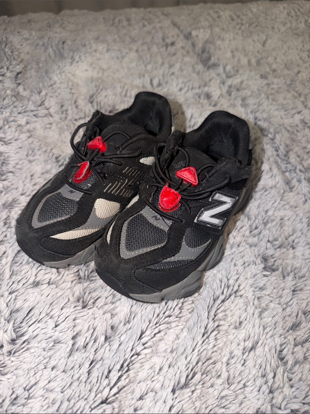 New Balance Kids Black & Gray Sneakers with Red Toggle Accents